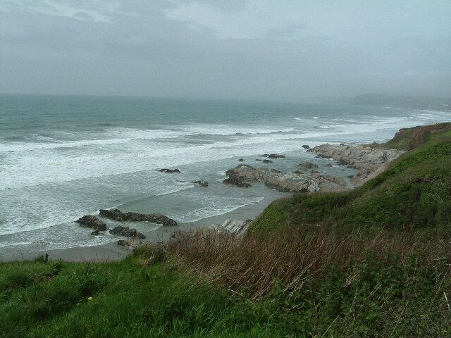 Looking out to sea near Sharrow Point. Sharrow Point juts out to sea on Whitsand Bay near Freathy.