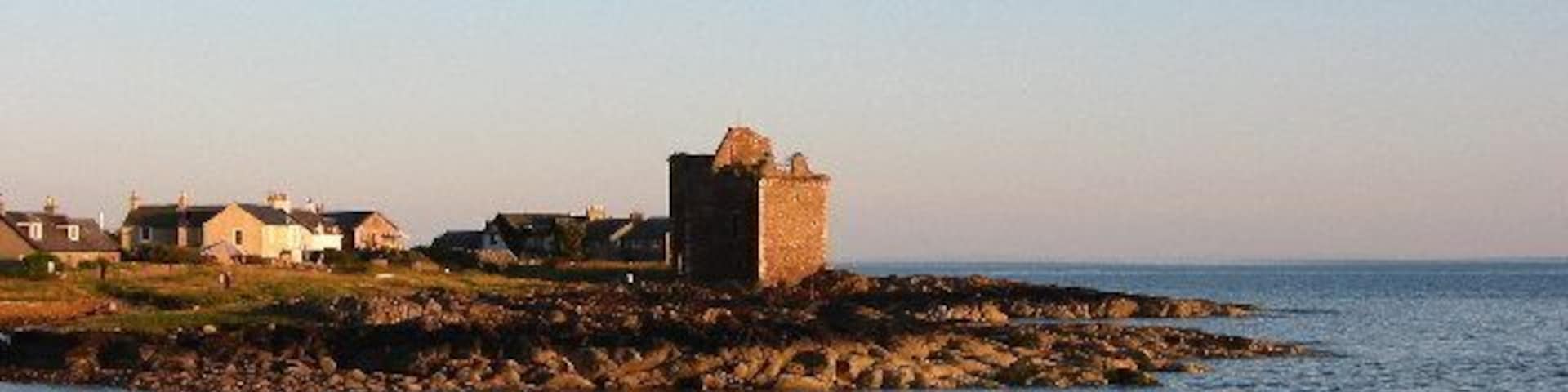Portencross Castle at sunset.