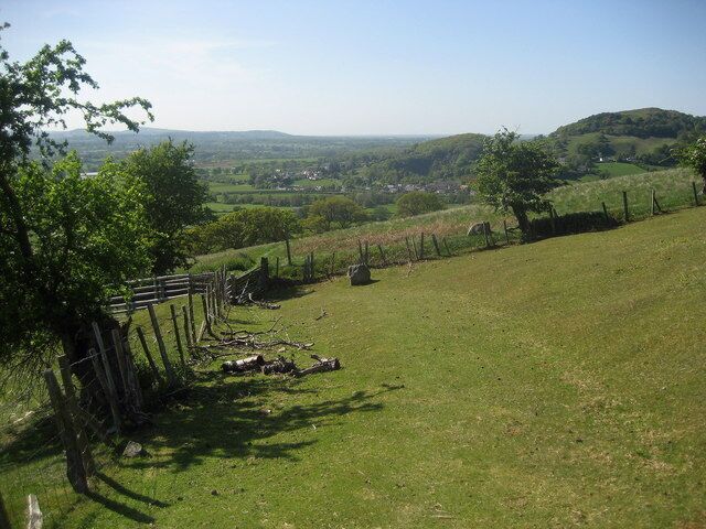 Descent to Bodfari Offa's Dyke Path gradually descending towards the village seen in the middle ground.