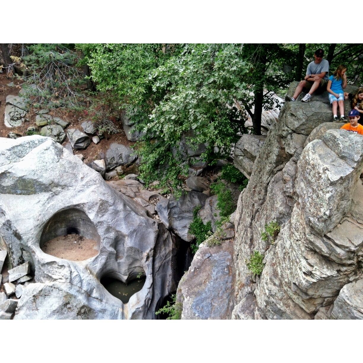 Heart Shaped hole on the granite next to the waterfall. The trail is hard to find because it's not an official attraction in Crestline but you can just ask locals and they will guide you to the Heart Rock. 