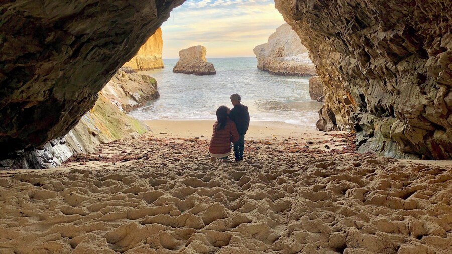 Sitting under a sea cave with my little one at Shark Fin Cove. A picturesque beach with stunning views of Northern California's stunning coastal landscape. During low tide, you can explore all kinds of sea creatures in the tide pools and if you're lucky, you can spot humpback whales during their migration season. There is a small parking lot by a discontinued railroad track where you can park your car and walk across to the beach entrance. It can be a bit steep and slippery at times so wear good shoes! #Adventure #beautifulplaces #familytime #memories #discoveries #exploring #withchildren #nature #outdoors #lanscape #northerncalifornia #beaches #usa #sharkfincove #davenport #santacruz