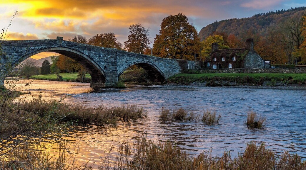 We stayed in Llanwrst for a few nights and on our last morning just after we loaded up the car the sky was being lit up by the rising sun - our first encounter of the bridge was meeting another car midway and it having to back down as it is only wide enough for one vehicle - I think this bridge causes a few problems at busy times. There is also a delightful tearoom which is situated in the adorable cottage you can see called Sunrise colour over Tu Hwnt Ir Bont and they do just the best scones! This is a delightful place to stay for a break in beautiful Snowdonia just a few miles away from Betws-y-Coed. #Instone #snowdonia