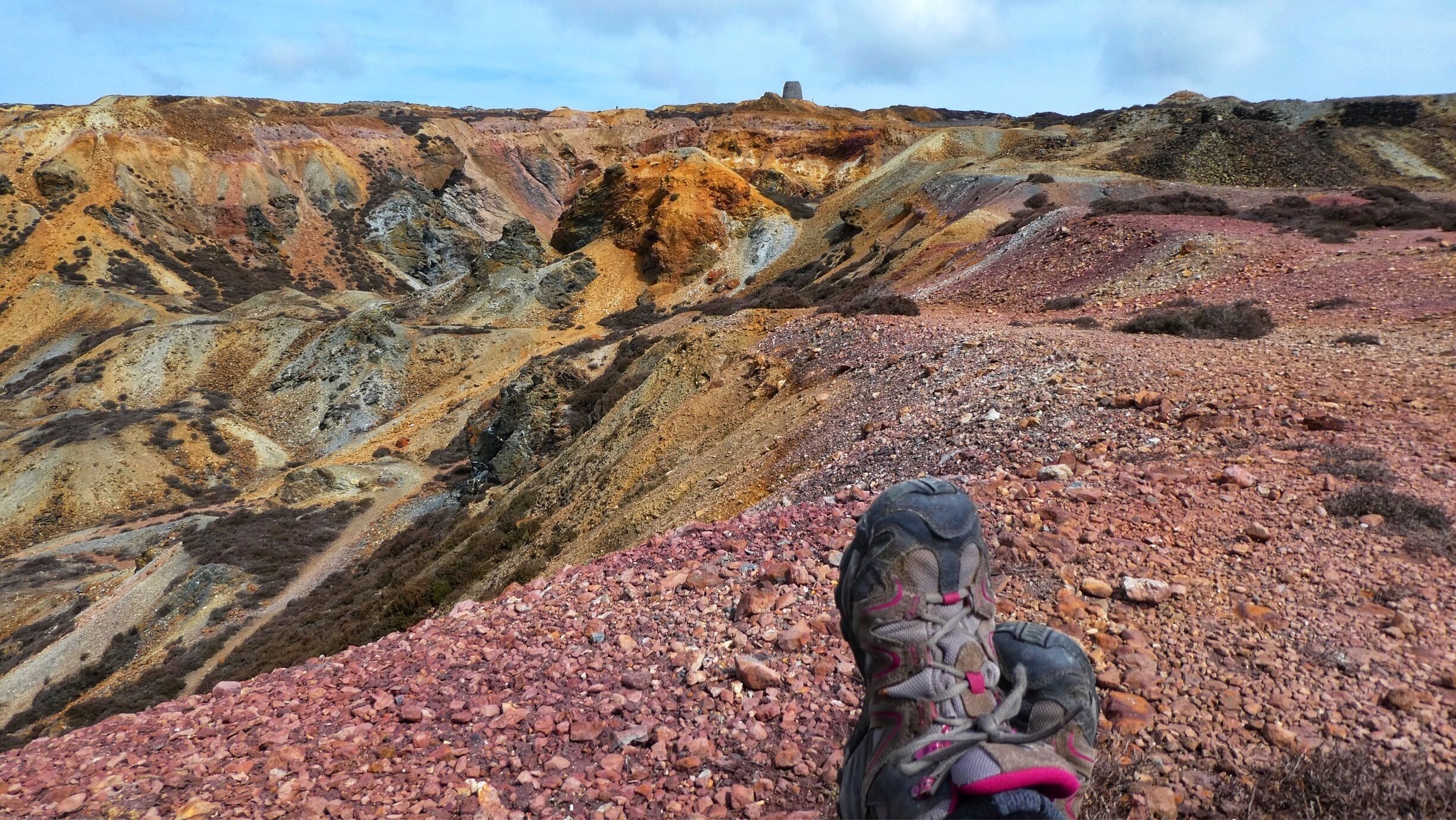 Boots with a view of Parys mountain 