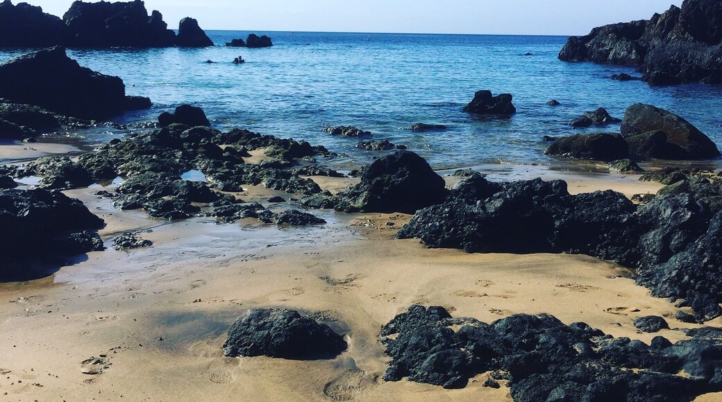 This cove is wonderful for snorkelling, swimming and sunbathing. This is again beautiful to look at with the contrasting volcanic rock and sand. This is my favourite beach.
