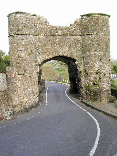 A stone archway on a road.
