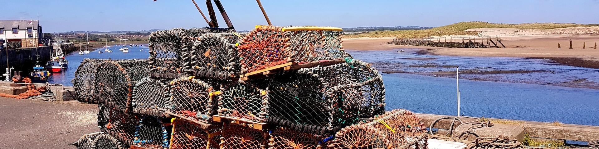 Fisherman's lobster pots on Ambled harbour waiting to be loaded