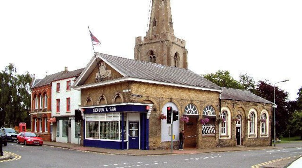Holbeach Town Crossroads. The view of Drydens Jewellers with the church behind. The building in the foreground was formerly the fire station