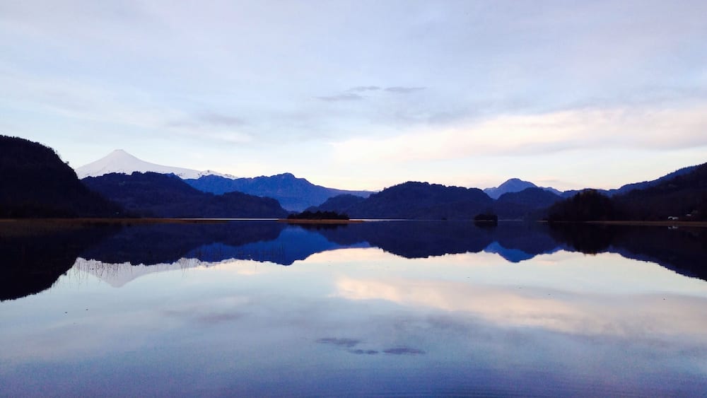 A lakeside view to the #volcano Villarica close to the small town Panguipulli