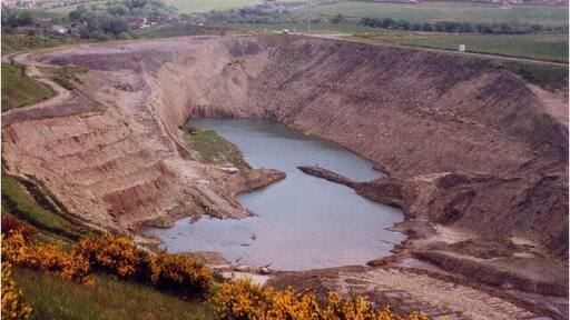 Blaydon quarry. This large pit near the A695 was formerly a source of building sand.This is some distance from the working quarry which is further South over the A695. The pit has been disused for some years. I believe there are plans to fill it with refuse, this may have even begun by now!