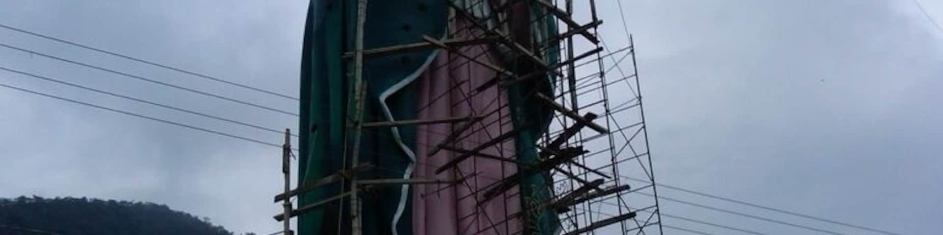 Large statue of the Virgin de Guadalupe, shown here under construction. Incredible view of Xicotepec and the surrounding mountains.