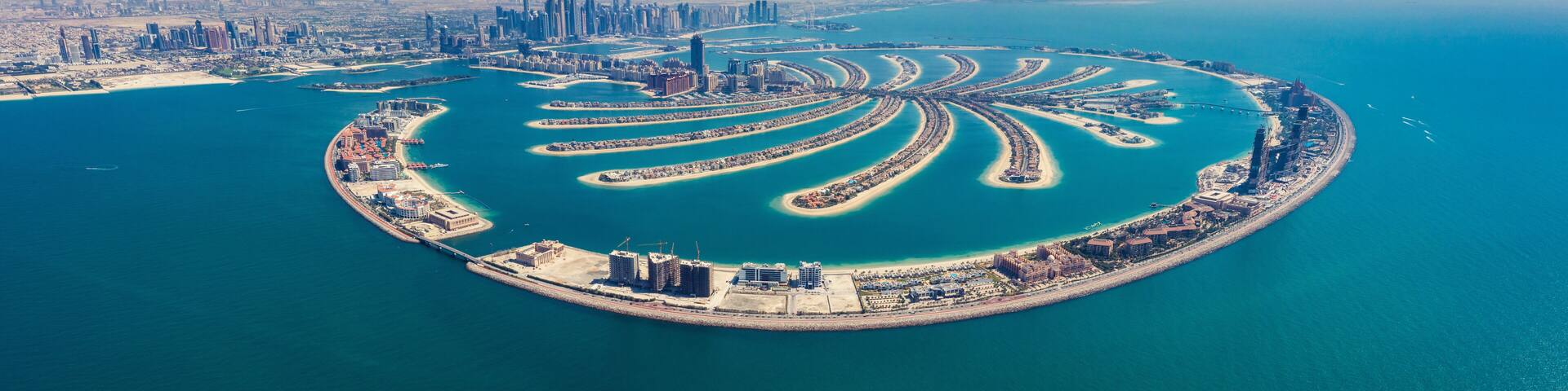 Aerial view on Palm Jumeira island in Dubai, UAE, on a summer day.