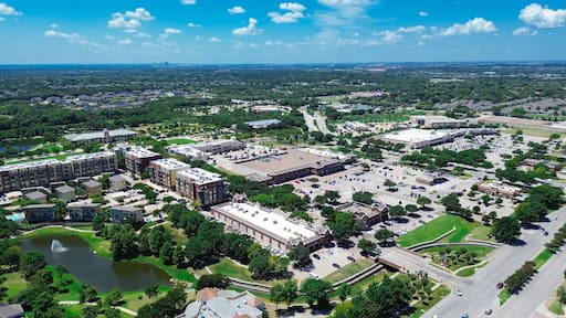 Lakeside modern apartment buildings in downtown Keller, Texas, along Keller Parkway, Farm to Market Road 1709, fast-growing mixed-use development suburbs Dallas Forth Worth Metroplex, aerial