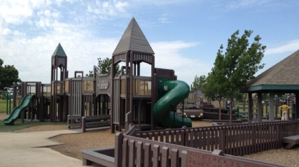 Great park for kids with open fields nearby. Right next to the Keller public library.