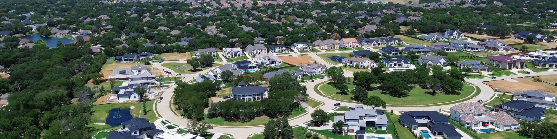 Panorama aerial mansion houses near West Southlake Boulevard in upscale residential neighborhood of Keller, TX, suburbs Dallas Fort Worth metroplex, new construction luxury homes, urban sprawl