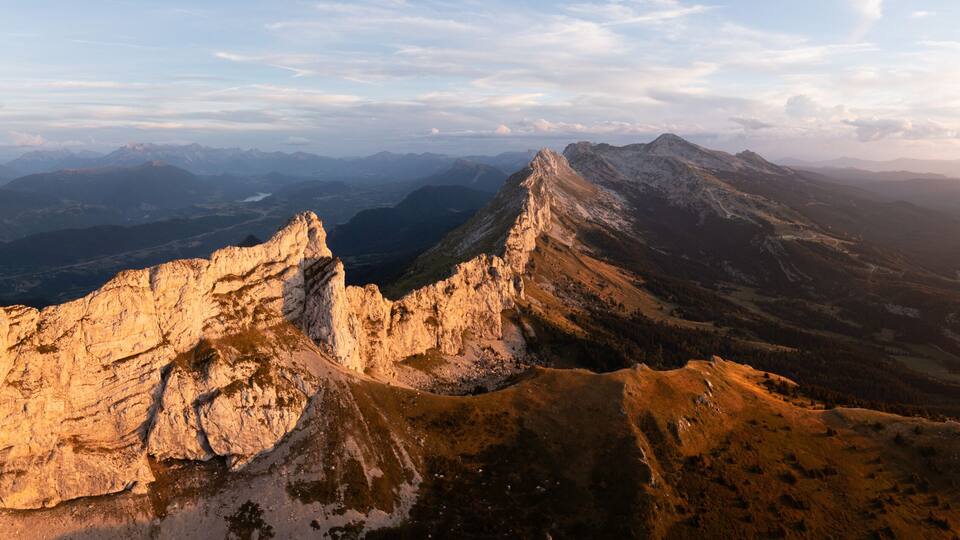 A mountain range with prominent peaks and valleys.