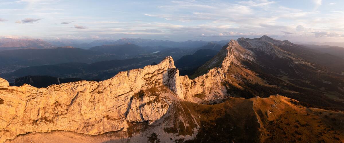 A mountain range with prominent peaks and valleys.