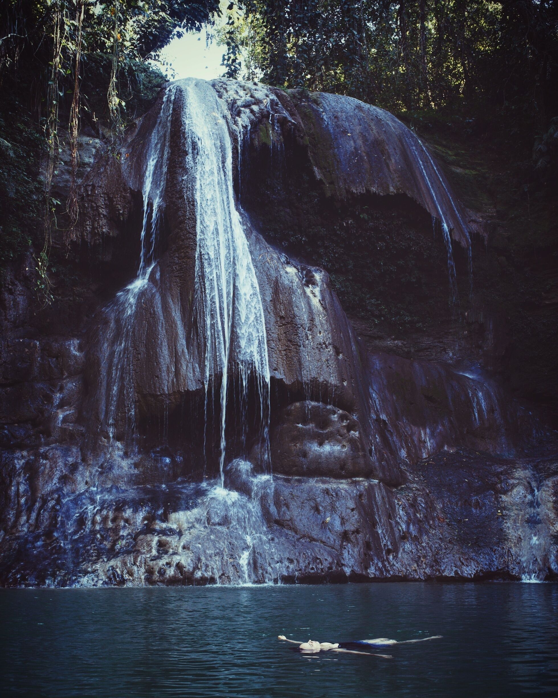 Large secluded waterfalls, with a deep water pool below with small fishes. A small air hole exists on the right hand side, and you can climb up and jump of the waterfall for the daring! 