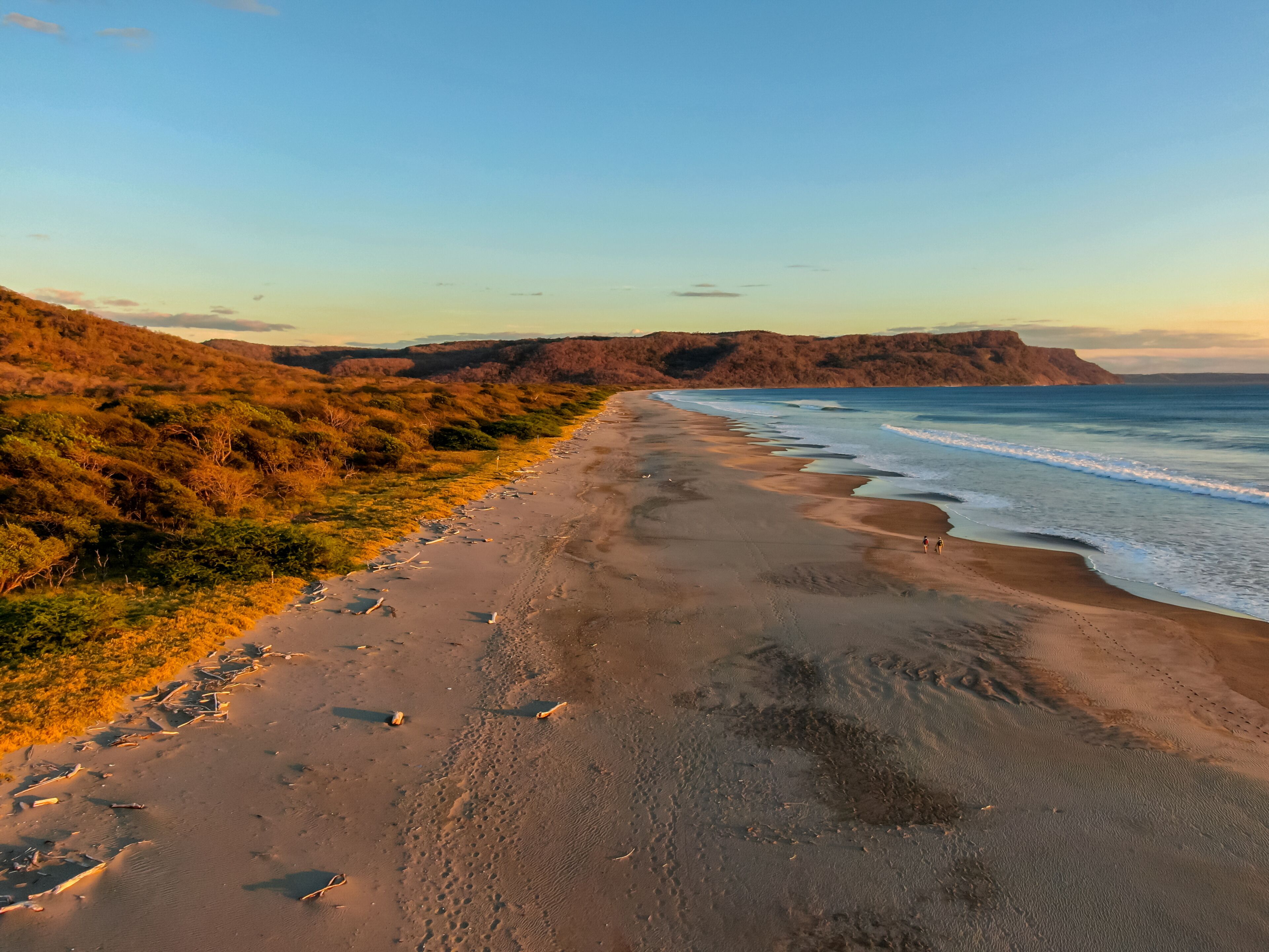 Beautiful aerial view of a sunset in  Naranjo Beach - Witch Rock Costa Rica