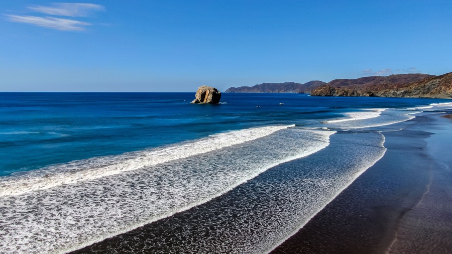 Beautiful aerial view of a sunset in Naranjo Beach - Witch Rock Costa Rica