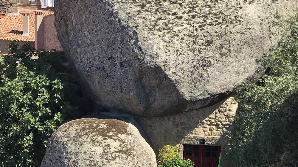 When in Portugal, take the time to visit Monsanto. Where boulders, homes, and shops work together. It is an incredible little town where you can wander the quiet streets and never grow tired of what you see.