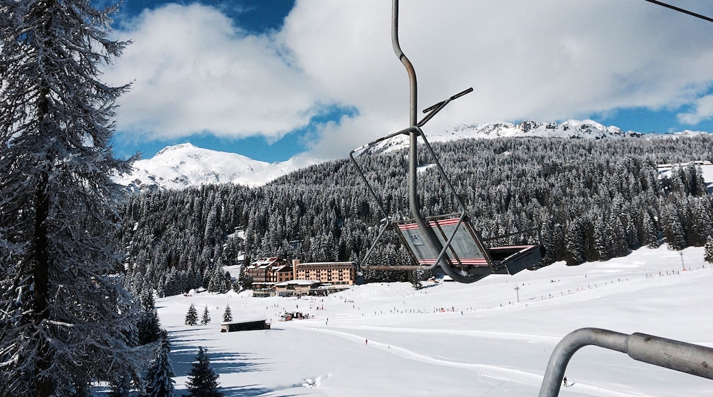 Ski Lifts Above Snowcapped Mountains During Winter