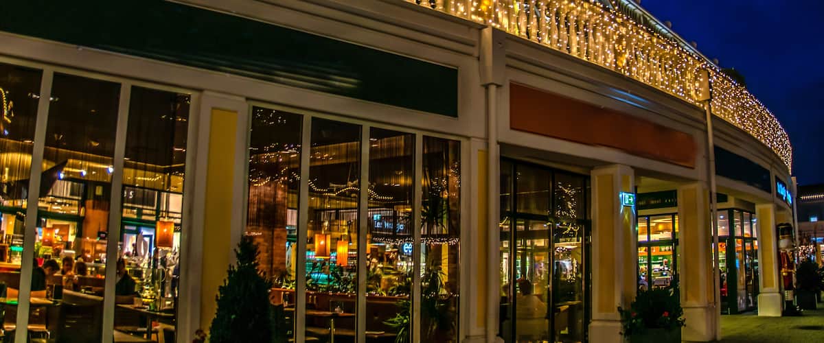Restaurant in the eveningwith lights in Parndorf outlet in Vienna, Austria