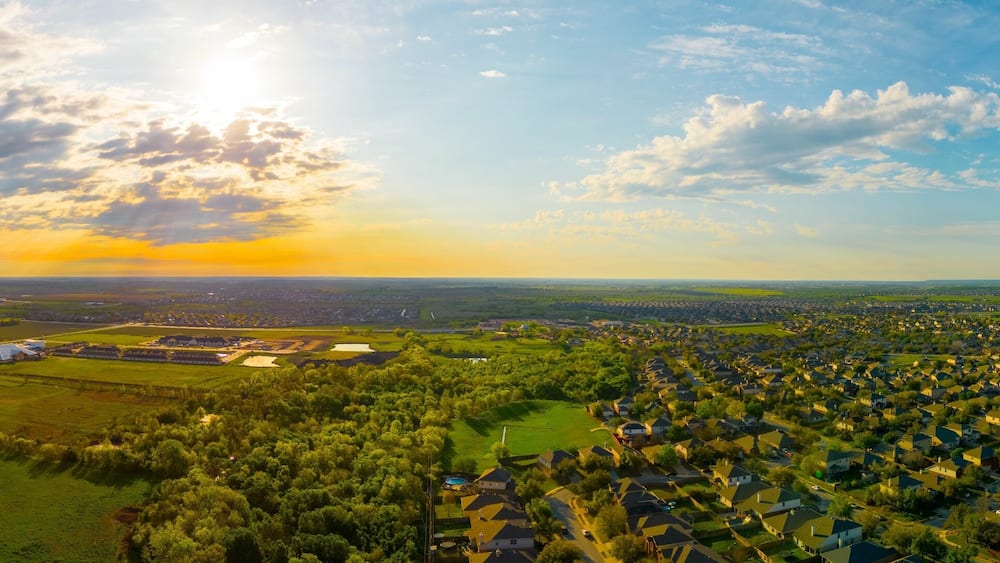 Stunningly beautiful sunrise illuminates Lake Pflugerville in the Villages of Hidden Lake