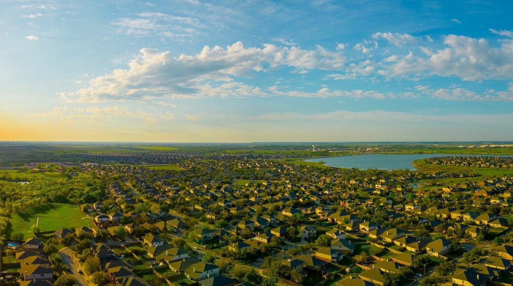 Stunningly beautiful sunrise illuminates Lake Pflugerville in the Villages of Hidden Lake