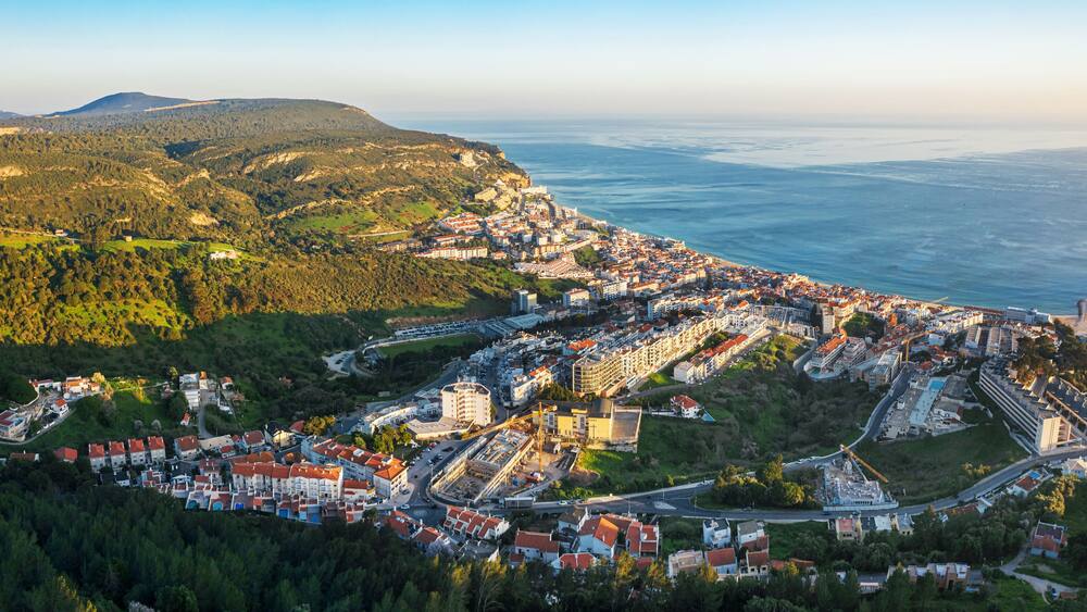 Drone aerial view on Sesimbra, fishing town in Setubal district in Portugal.