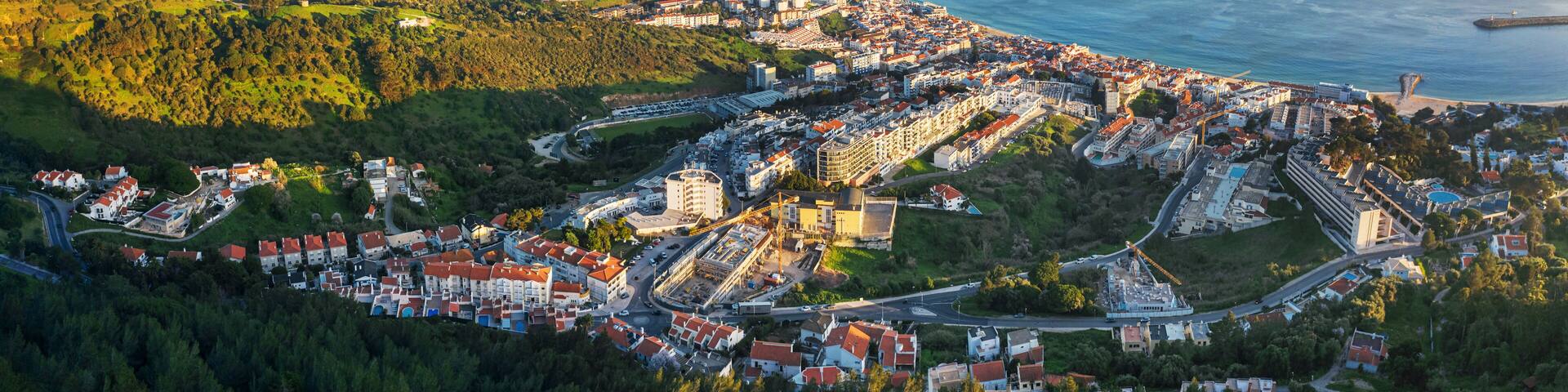 Drone aerial view on Sesimbra, fishing town in Setubal district in Portugal.