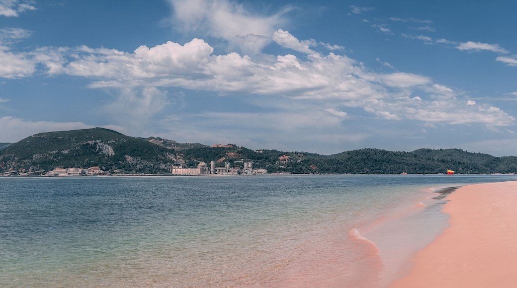 The sandy Bico das Lulas Beach in Troia, Portugal