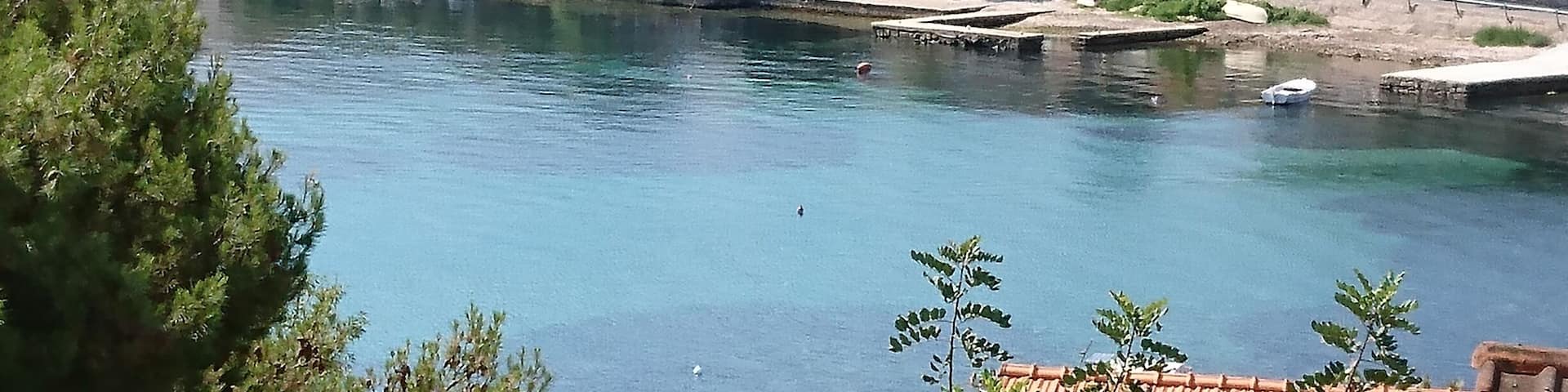 Small town of Lumbarda, view from the balcony with sicardas humming in the background.