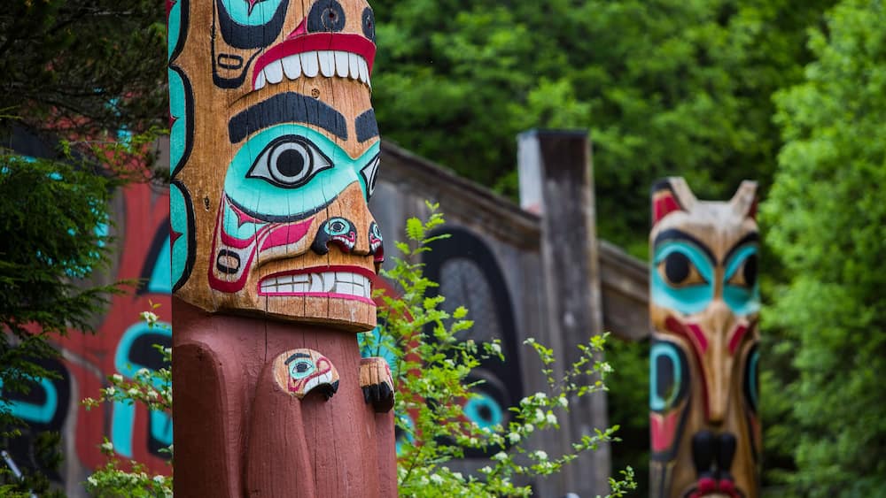 Totem Poles Near Saxman Tribal House