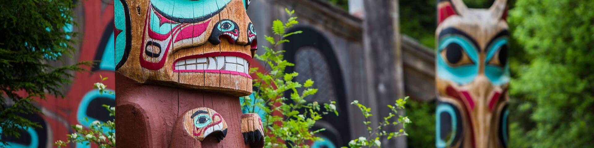 Totem Poles Near Saxman Tribal House