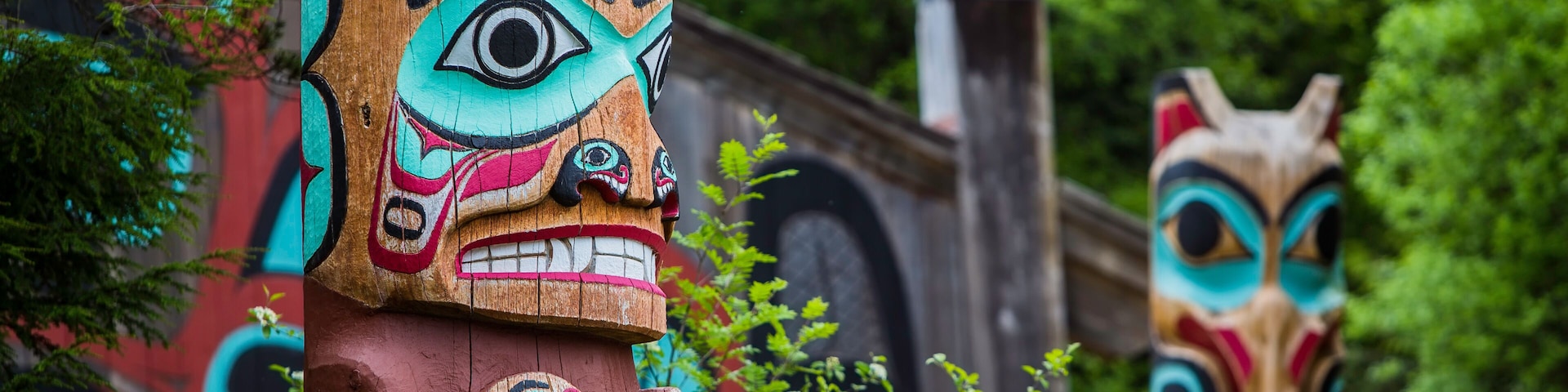 Totem Poles Near Saxman Tribal House