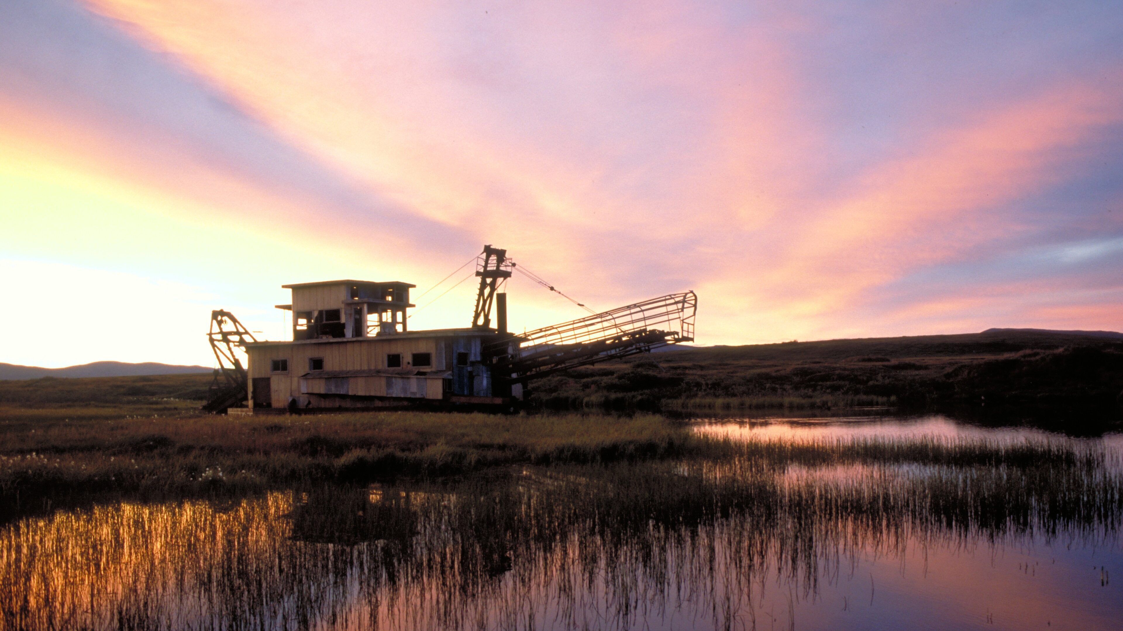 Alaska occidental que incluye pantano, escenas tranquilas y un atardecer