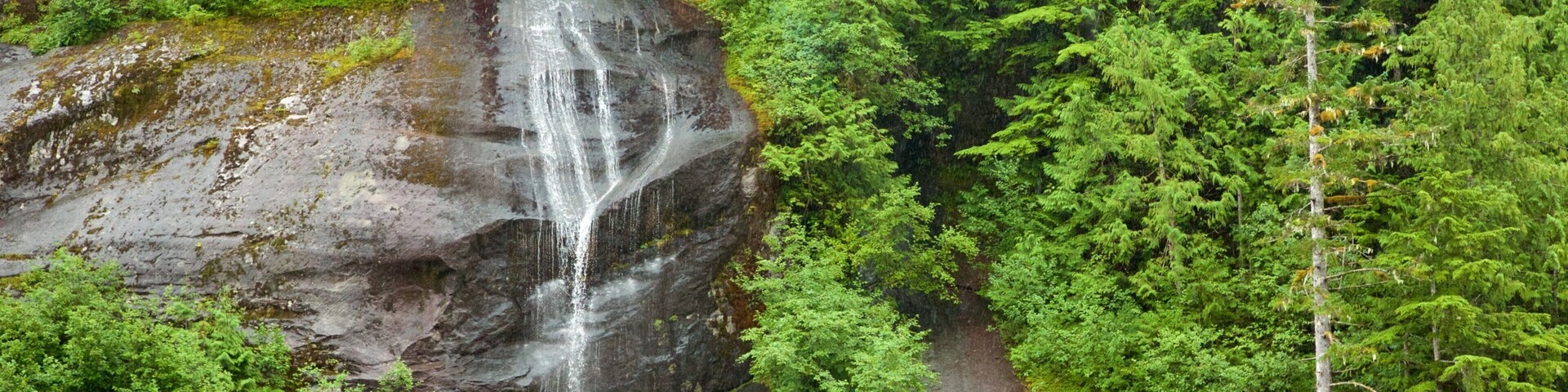 Misty Fjords National Monument showing a cascade
