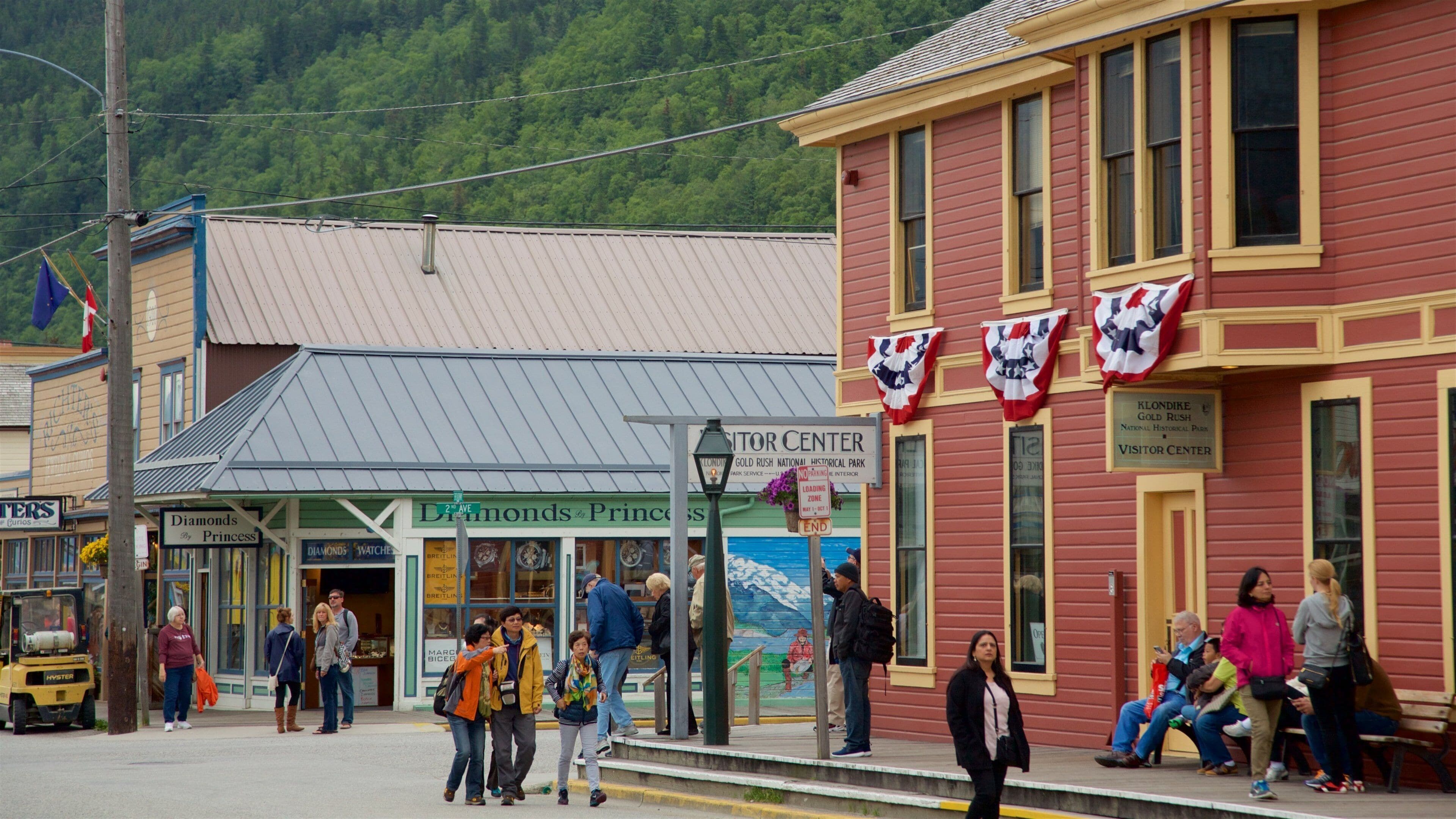 Klondike Gold Rush National Historic Park featuring a small town or village as well as a small group of people