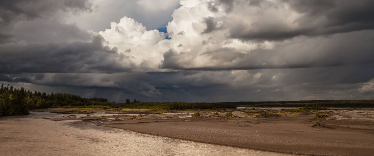 Storm clouds over the Copper River in Alaska in summer.