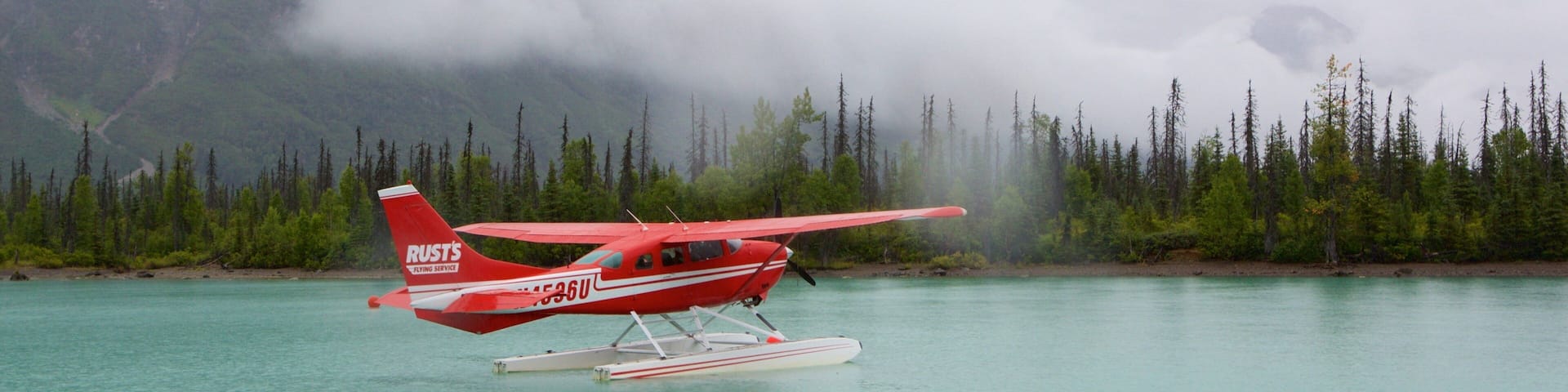 Lake Clark National Park showing forest scenes and a lake or waterhole
