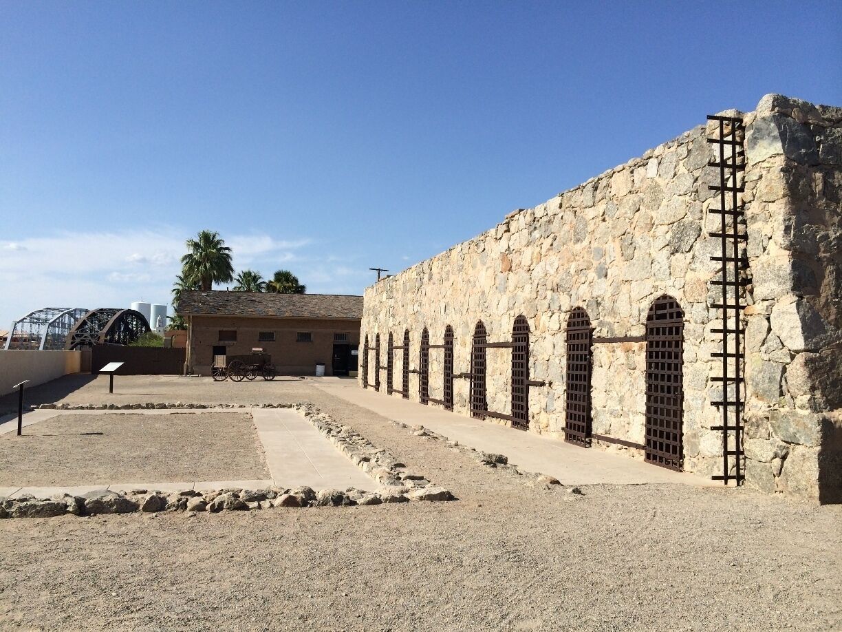 Visiting the cell blocks in a fun adventure on a non 100+ degree day in Yuma, Arizona. In the distance you can see the Ocean to Ocean Bridge, which used to be the only crossing over the once must larger Colorado River that runs through Yuma. #WhiskeySister