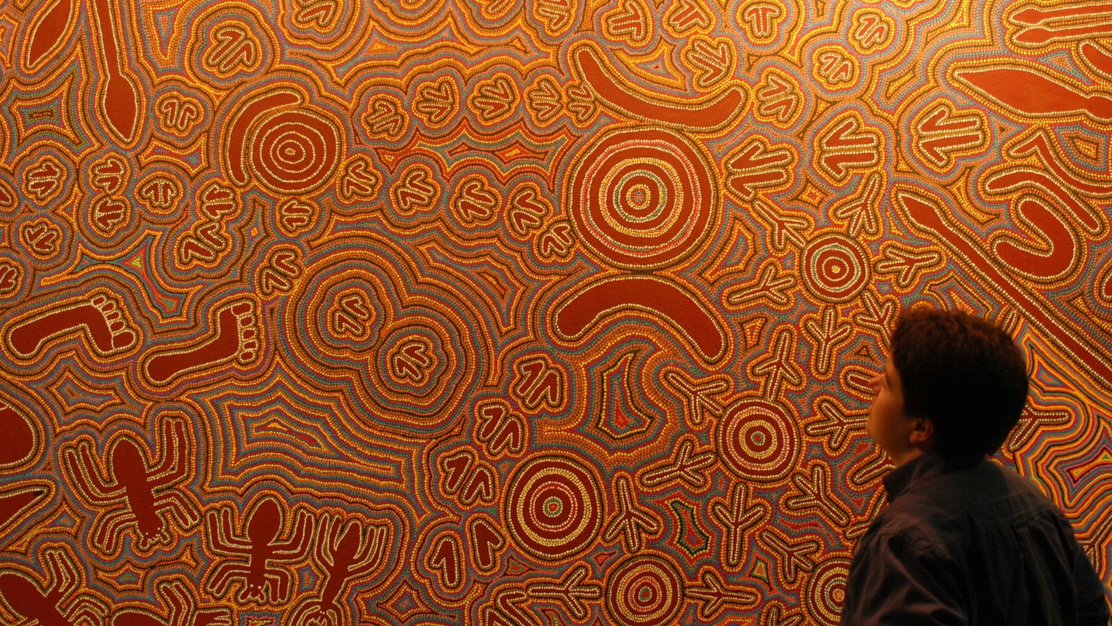 South Australian Museum which includes interior views and art as well as an individual male