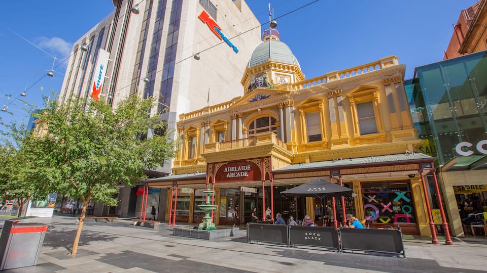 Adelaide Arcade with a prominent dome and ornate architecture.