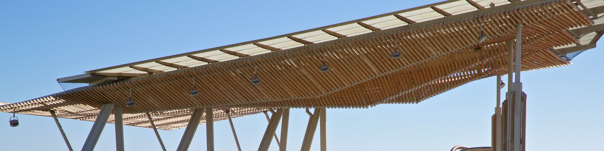 Henley Beach which includes a park and general coastal views as well as a small group of people