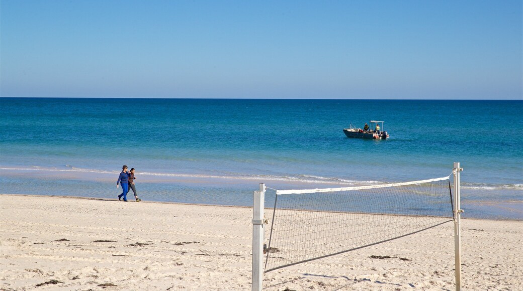Henley Beach which includes a sandy beach, general coastal views and boating