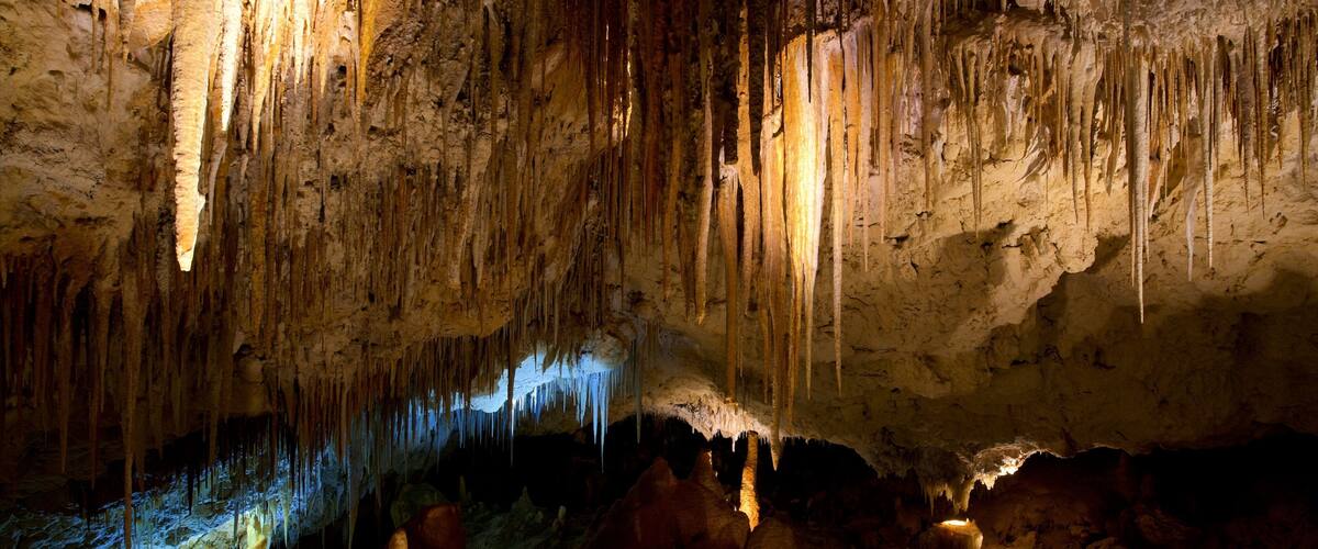 A cave with stalactites and stalagmites.