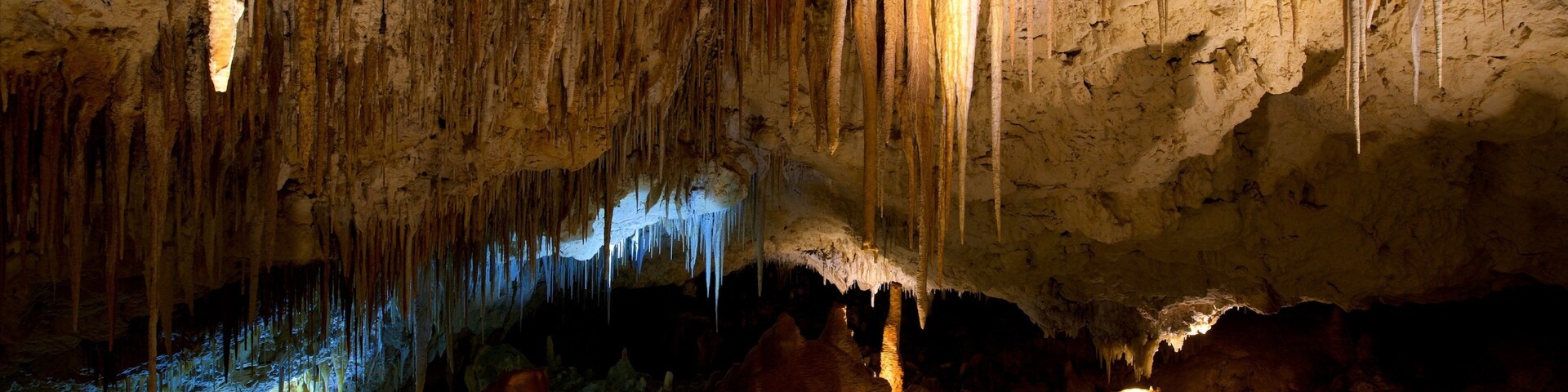A cave with stalactites and stalagmites.