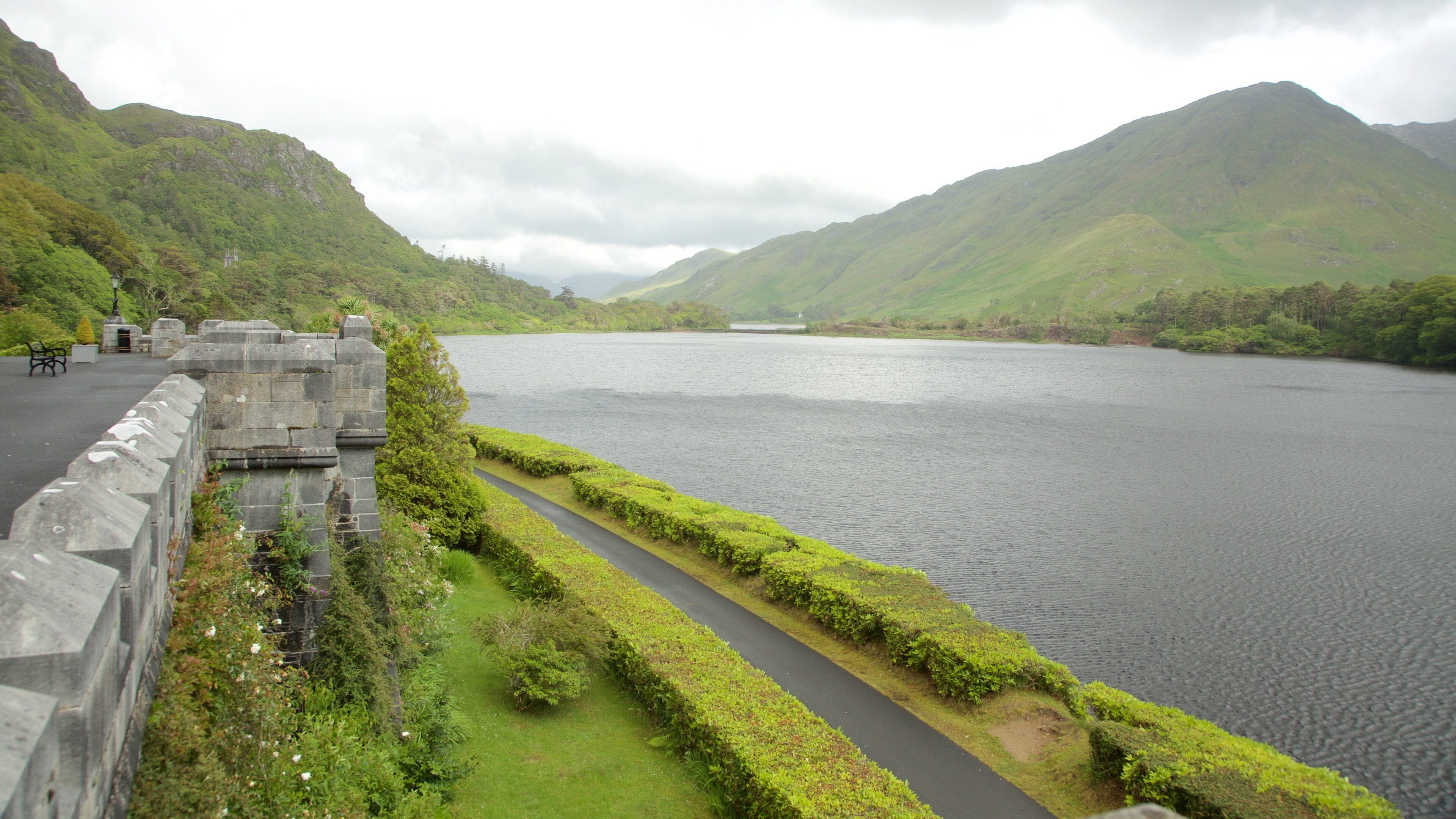 Kylemore Abbey showing a river or creek, chateau or palace and heritage architecture