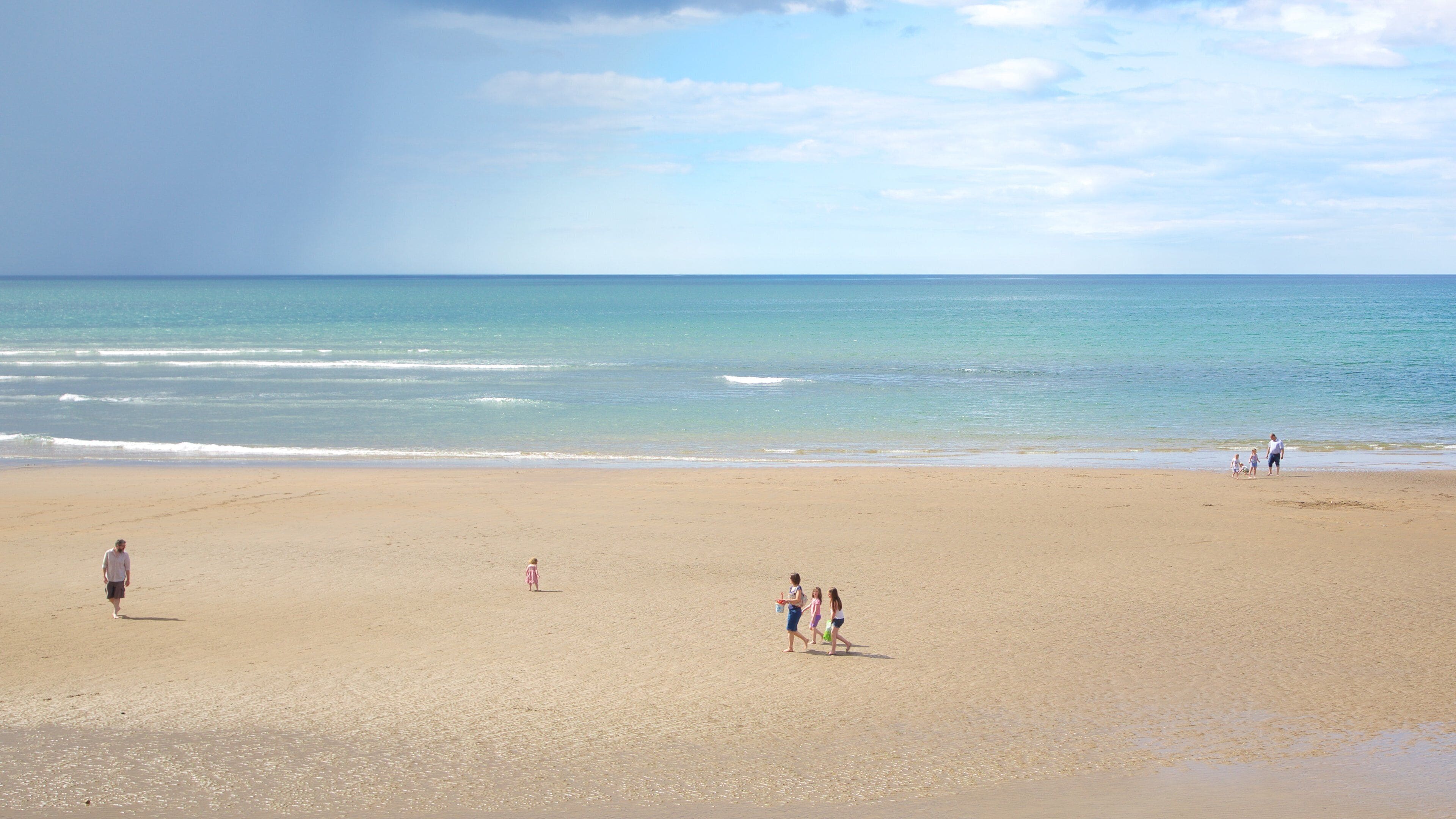 Strandhill Beach which includes a beach as well as a small group of people