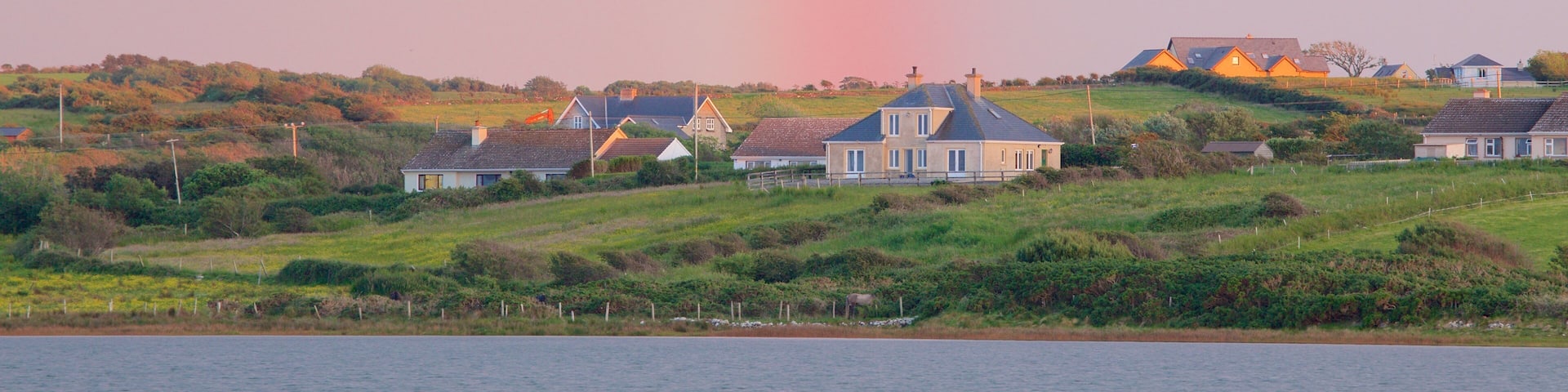 Ben Bulben which includes a river or creek and a sunset
